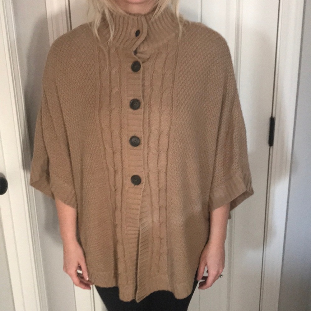 Tan poncho cardigan.
